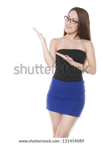 Lovely woman holding something imaginary against white background