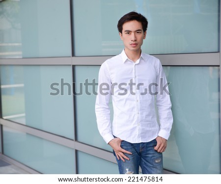 Portrait of college student in jeans at college