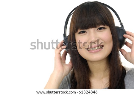 Close-up portrait of a girl listening music at headphones, border