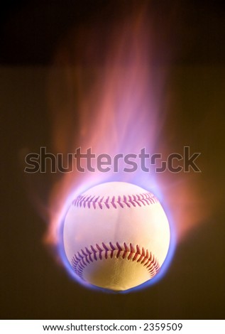 A flaming baseball, fire mostly going up.