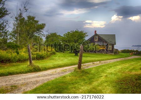 Road to a house on the edge on the ocean