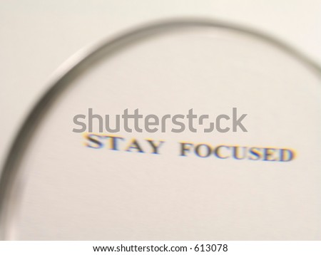 Stay Focused (in magnifying glass- intentionally blurred)
