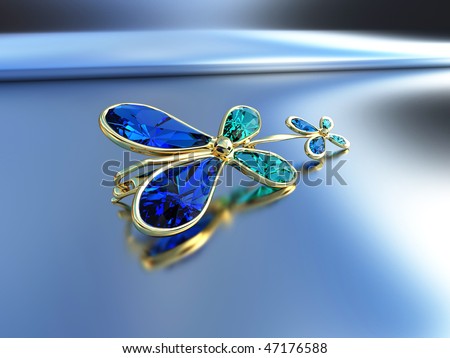 Jeweller product - an earring, gold and a jewel on a blue background