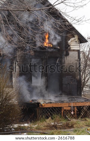 Urban abandoned  Detroit House on fire in the winter