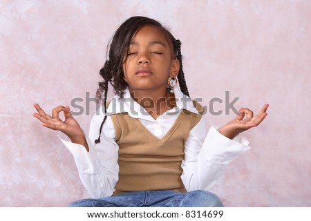 A African American girl in a meditation pose