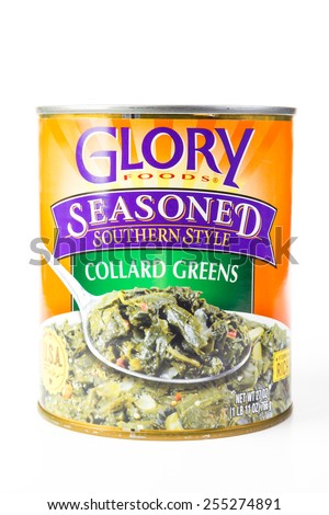 LLANO, TEXAS-FEB 23, 2015:  Can of Glory Foods Collard Greens seasoned Southern Style against white background with copy space.  Soul food in a can.