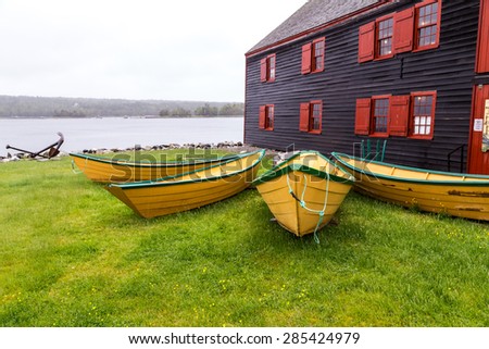 Group of Shelbourne Dory Boats on display outside the world renowned Dory building shop in Shelbourne Nova Scotia.