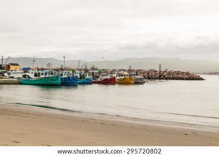 CABOT TRAIL, NOVA SCOTIA-JUN 5, 2015: Colorful fishing vessels and quaint fishing villages create plentiful photographic opportunities along the famous Cabot Trail of Nova Scotia, Canada.