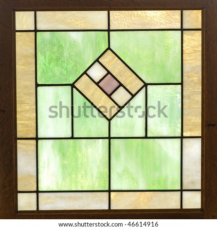 Closeup of back lighting on an antique lead glass window in a square format