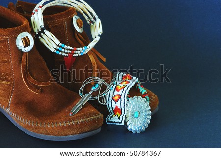 Montage of Native American Moccasins and handcrafted jewelry made from silver, turquoise,beads, antlers,horns, and coral.