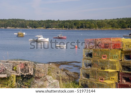 Lobster Pots and fishing boats in Broad Cove Harbor, Maine