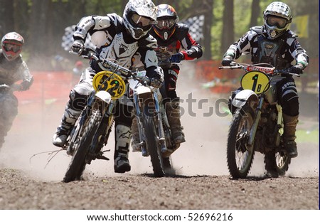 JEFFERSON, TEXAS - APRIL 5:  Dirt and dust surround start of race as riders relive past glories in AHRMA Vintage Motocross National Championship Series race in Jefferson, TX on April 5, 2009.