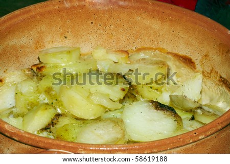 Dish full of baked potato