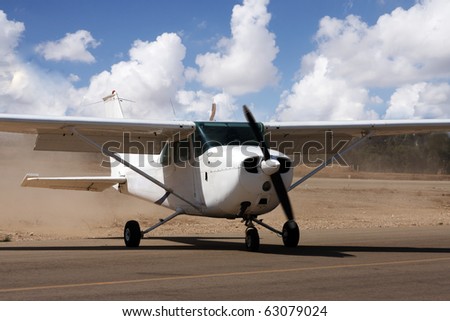 Small airplane in a small desert airport