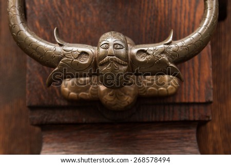 door handle on the door of an old building