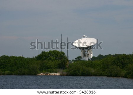 Tracking Satellite Dish against mottled sky with Everglades in foreground PHOTO ID: KSCRadar00016_RJ