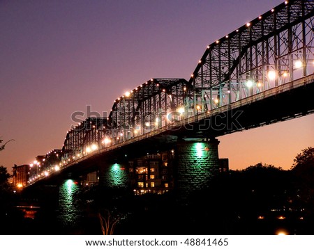 historic Walnut Street bridge now a pedestrian bridge taken at sunset in downtown Chattanooga, Tennessee