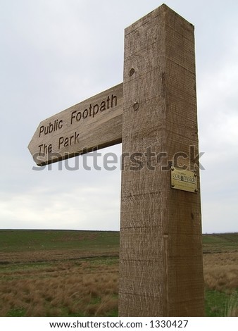 Sign post for a public footpath in the countryside