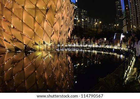 HONG KONG, CHINA - OCT 1: Traditional Chinese lanterns with height over 10 meters light up in Victoria Park to celebrate the mid-autumn festival, and national day of China on 1st October, 2012