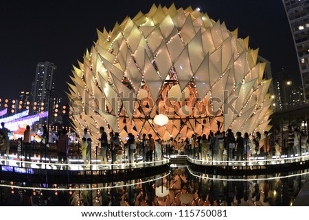 HONG KONG, CHINA-OCT 1: People queued up for the lighting show inside Traditional Chinese lanterns with 10m height in Victoria Park to celebrate the mid-autumn festival on 1st Oct, 2012 in Hong Kong