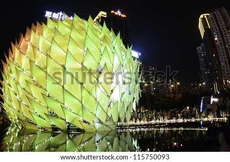 HONG KONG, CHINA - OCT 1: Traditional Chinese lanterns with height over 10m light up in Victoria Park to celebrate the mid-autumn festival, and national day of China on 1st October, 2012 in Hong Kong