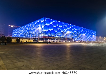 BEIJING - DECEMBER 14: The National Aquatics Center, the water cube, located in gym plaza lights up for celebrating the nearby community anniversary on December 14, 2009 in Beijing, China