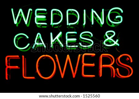 Wedding cakes and flowers neon sign