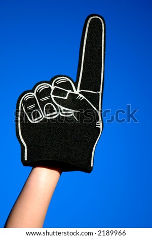 stock-photo--foam-finger-raised-and-isolated-against-the-blue-sky-2189966.jpg