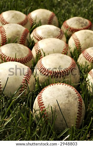 Nostalgic baseballs in the grass on a baseball field