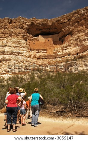 Family viewing the ancient Native American dwelling at Montezuma\'s Castle National Monument, Camp Verde, Arizona