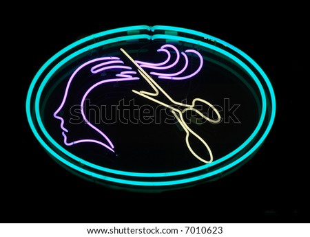 Illuminated scissors cutting long hair neon sign