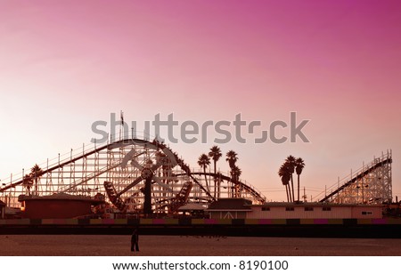 Big Dipper roller coaster at sunset at the Santa Cruz Boardwalk in California