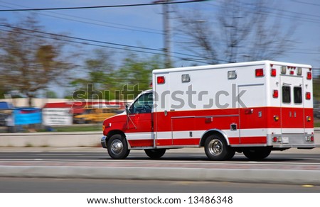 Ambulance speeding on an American street heading to an emergency