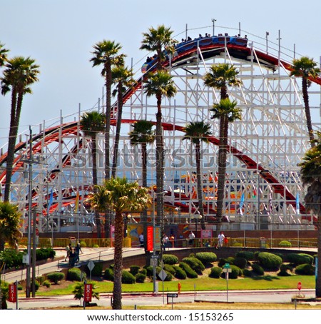Front of the Santa Cruz Beach Boardwalk amusement park featuring the historic Big Dipper wooden rollercoaster
