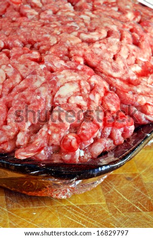 Closeup of a wrapped package of ground beef