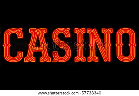 Red casino neon sign isolated on black