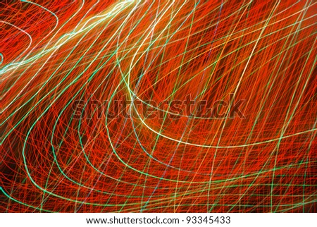 Streaks of colorful lights in motion