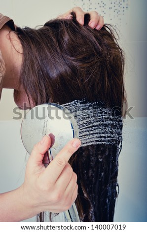 hair wash of woman in shower