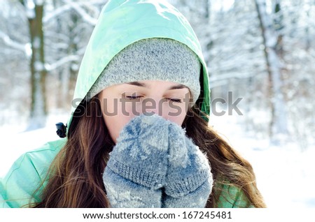 young woman in winter outdoors