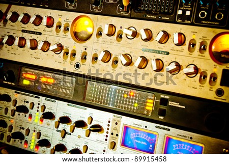 amplifier studio equipment with knobs and lamps