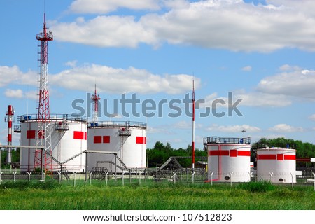 Oil tanks against the blue sky
