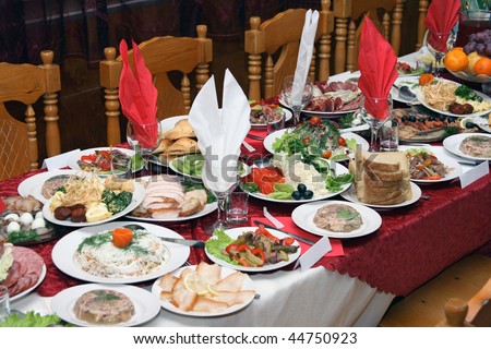 Festively covered Russian table with various dishes