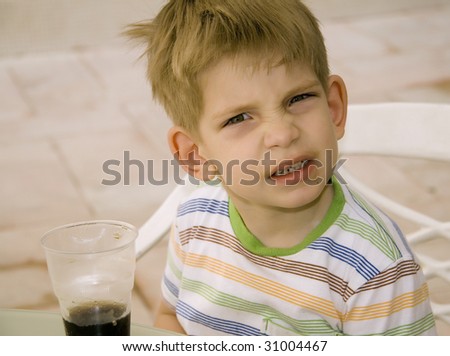 kid drinking soda
