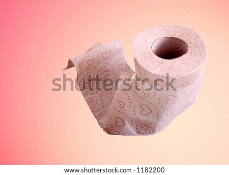 A roll of toilet paper on a pink background
