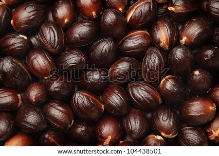 Background of nutmeg seeds with mace removed