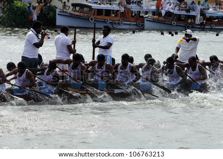 CHAMPAKKULAM, INDIA - JUL 03 : A team participate in the Snake boat racing at the banks of Pumba river on July 03, 2012 at Champakkulam, Kerala, India.