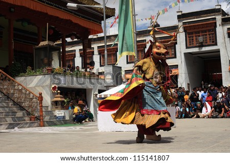 LEH, INDIA - SEPT 02 : Traditional artists perform Cham dance during Ladakh Festival on September 02, 2012 in Leh, India. Cham dance is a masked dance associated with some sects of Buddhists.