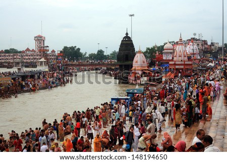 HARIDWAR, INDIA - AUG 27: Devotees gathered to make a holy dip at river Ganges on August 27, 2012 at Har ki Pauri ghat in Haridwar, India. Haridwar is one of the religiously important places in India