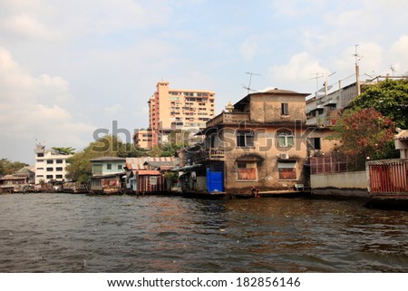 BANGKOK, THAILAND - FEB 12 : Chao Phraya river flows through the heart of capital city Bangkok on February 12, 2011. It is the principal river that flows through 365 km of land in Thailand.