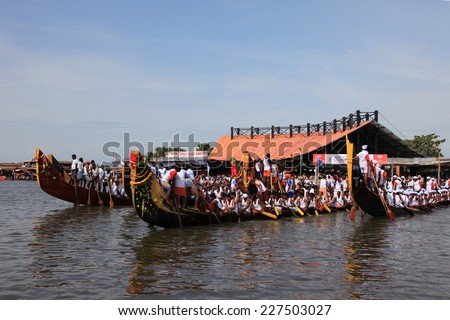 ALLEPPEY, INDIA - AUG 09 : Snake boat teams participate in the most popular Nehru Trophy Boat race held in August 09, 2014 in Alleppey,Kerala, India.